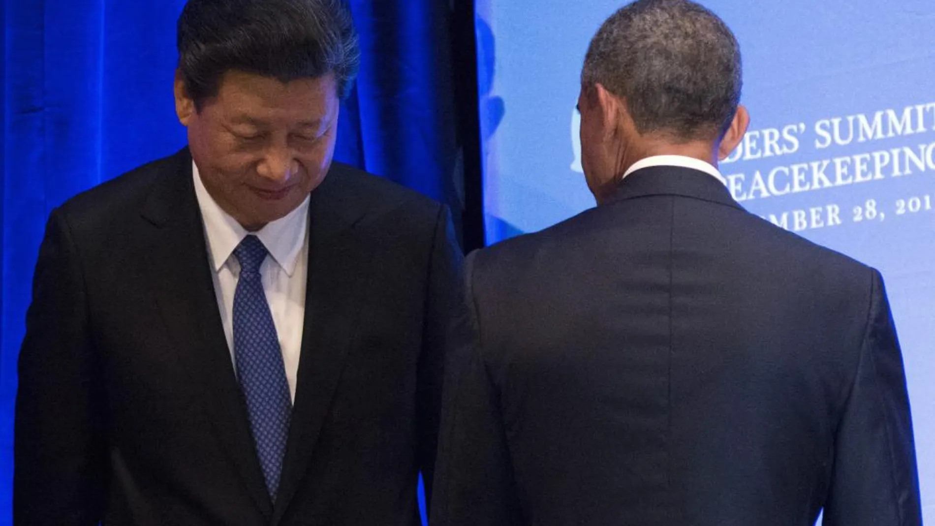 Xi Jinping se cruza con Barack Obama durante la Cumbre de Líderes para el Mantenimiento de la Paz en Nueva York (Estados Unidos)