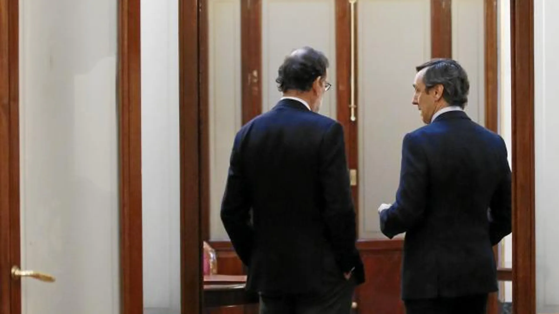 Mariano Rajoy y Rafael Hernando, ayer en el Congreso