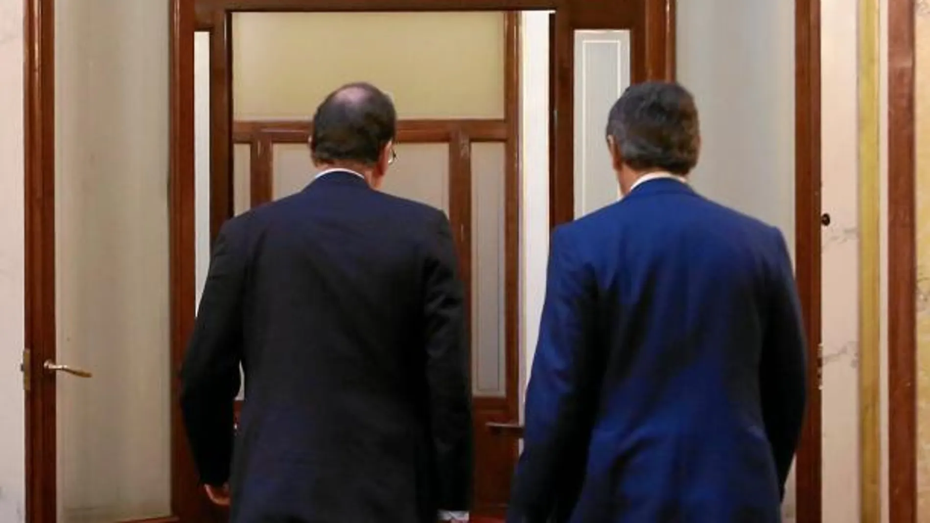 Mariano Rajoy, ayer, con el portavoz del PP en el Congreso, Rafael Hernando
