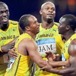 Carter, el segundo por la izquierda, junto a Bolt, Powell y Frater, nada más ganar el título olímpico en 2008