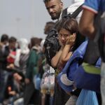 Inmigrantes sirios en el puerto del Pireo en Grecia