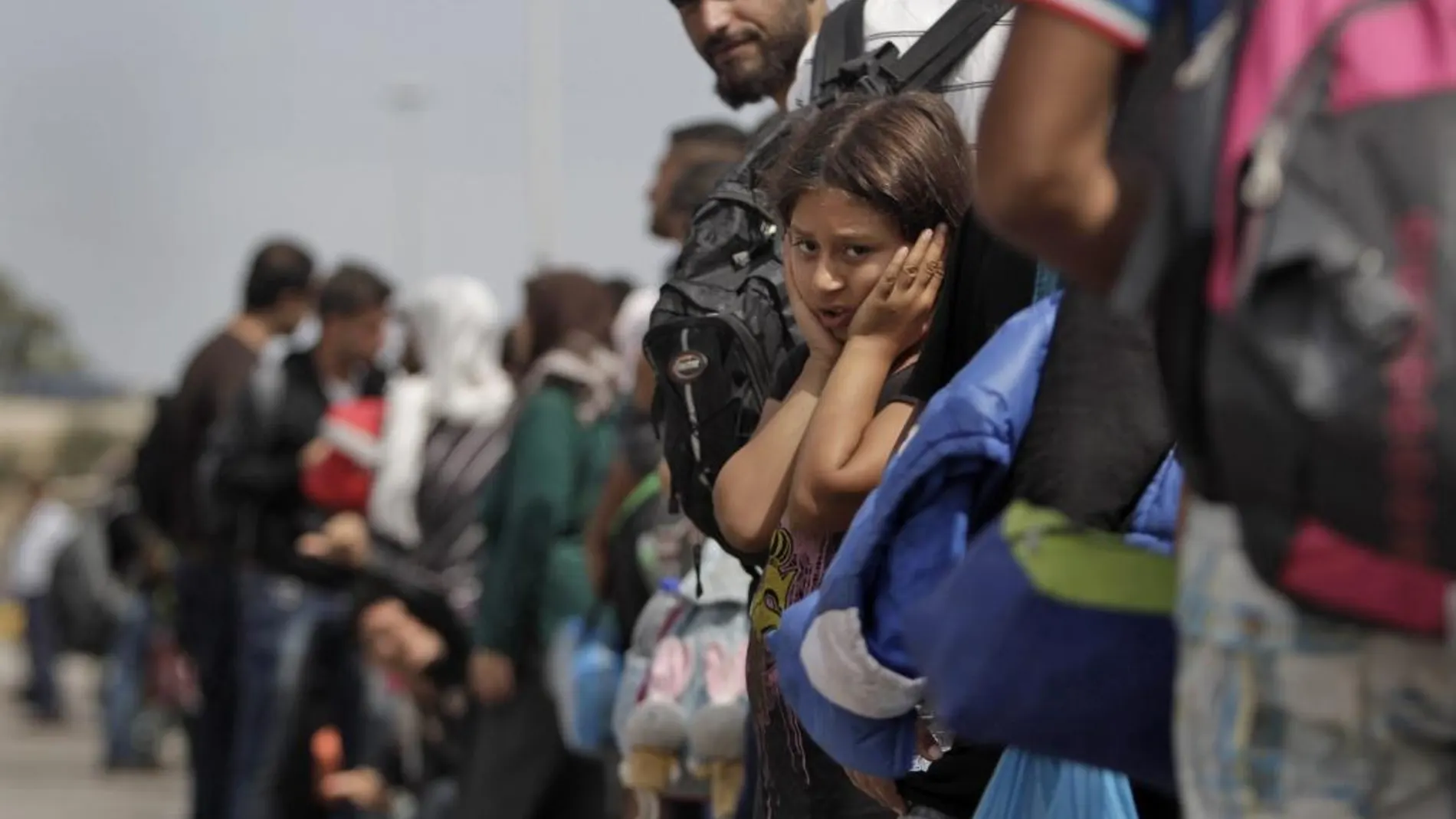 Inmigrantes sirios en el puerto del Pireo en Grecia