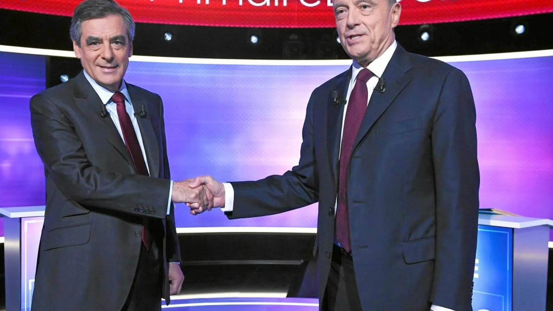 Alain Juppé y François Fillon, antes del debate de anoche