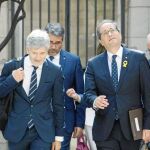 Marlaska y Torra, ayer, a la entrada de la Junta de Seguridad celebrada en Bracelona / Efe