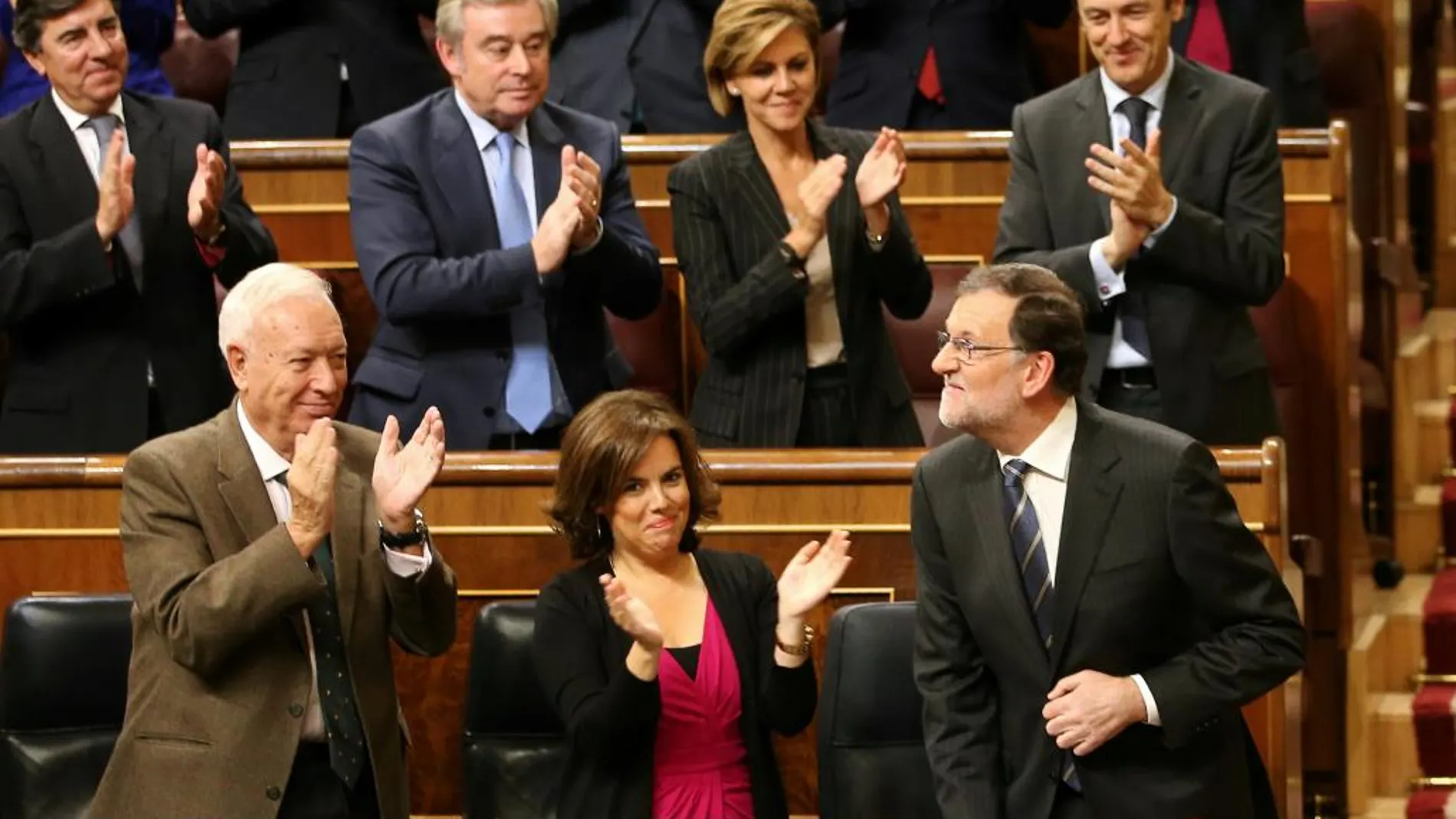 La bancada popular aplaude a Mariano Rajoy tras su discurso de investidura.