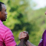 Tiger Woods y Justin Rose