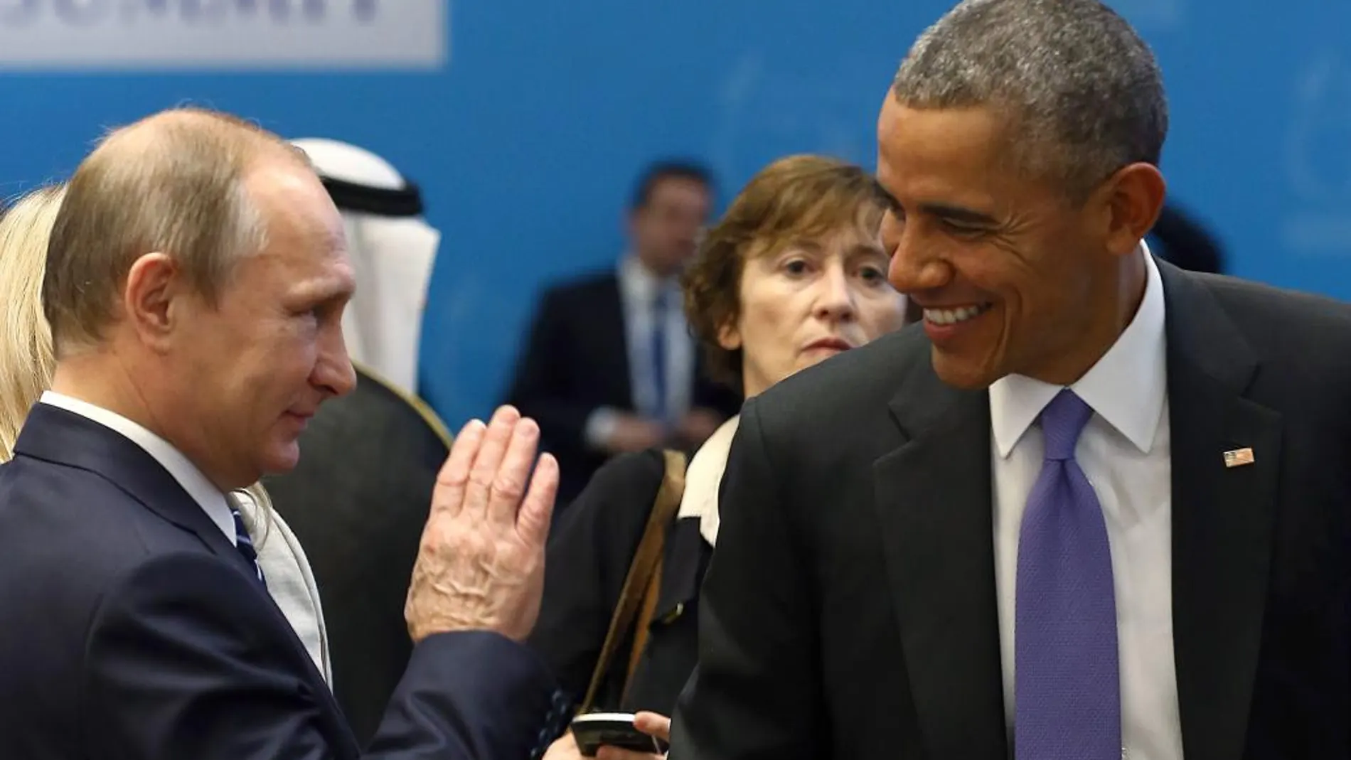 Los presidentes de REusia, Vladimir Putin (izqu.) y de Estados Unidos, Brack Obama (derch.) durante la cumbre del G20