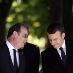 Francois Hollande, junto a Emmanuel Macron