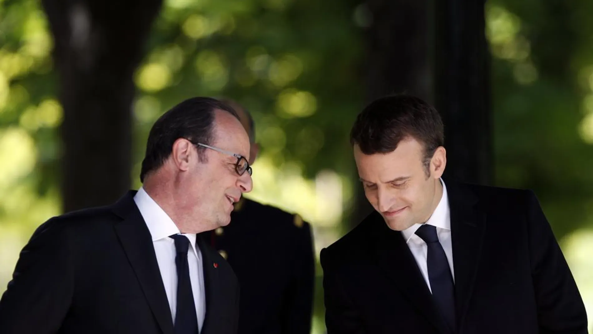 Francois Hollande, junto a Emmanuel Macron