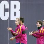 Ivan Rakitic, Adriano Correia, Leo Messi y Neymar jr, en el entrenamiento de ayer
