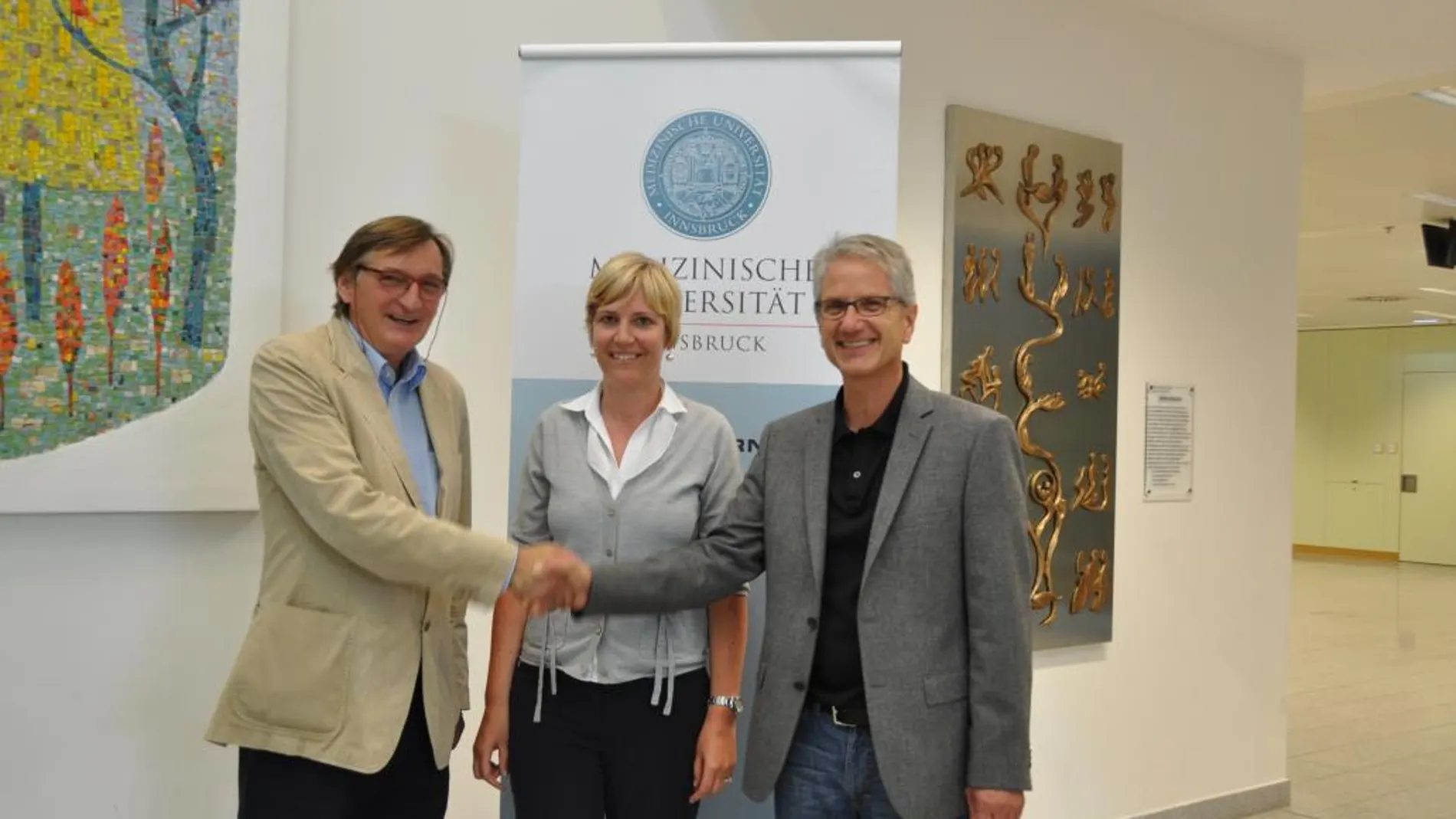 Jorg-Ingolf Stein, jefe de Cardiología Pediátrica en la Universidad Médica de Innsbruck, a la izquierda