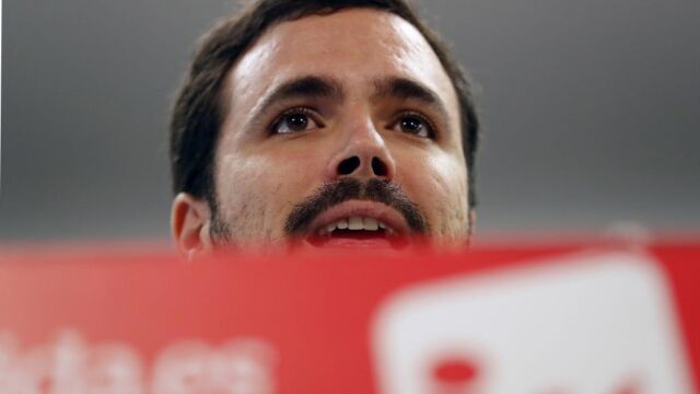 El coordinador federal de IU, Alberto Garzón, durante la presentación a la asamblea federal de su formación del informe que hace balance sobre la alianza con Podemos