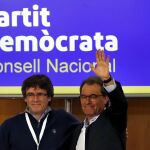 El presidente de la Generalitat, Carles Puigdemont y el expresidente Artur Mas