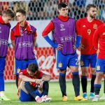 Los jugadores españoles lamentan la derrota frente a Alemania