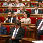 El presidente de la Generalitat, Carles Puigdemont, y el vicepresidente, Oriol Junqueras