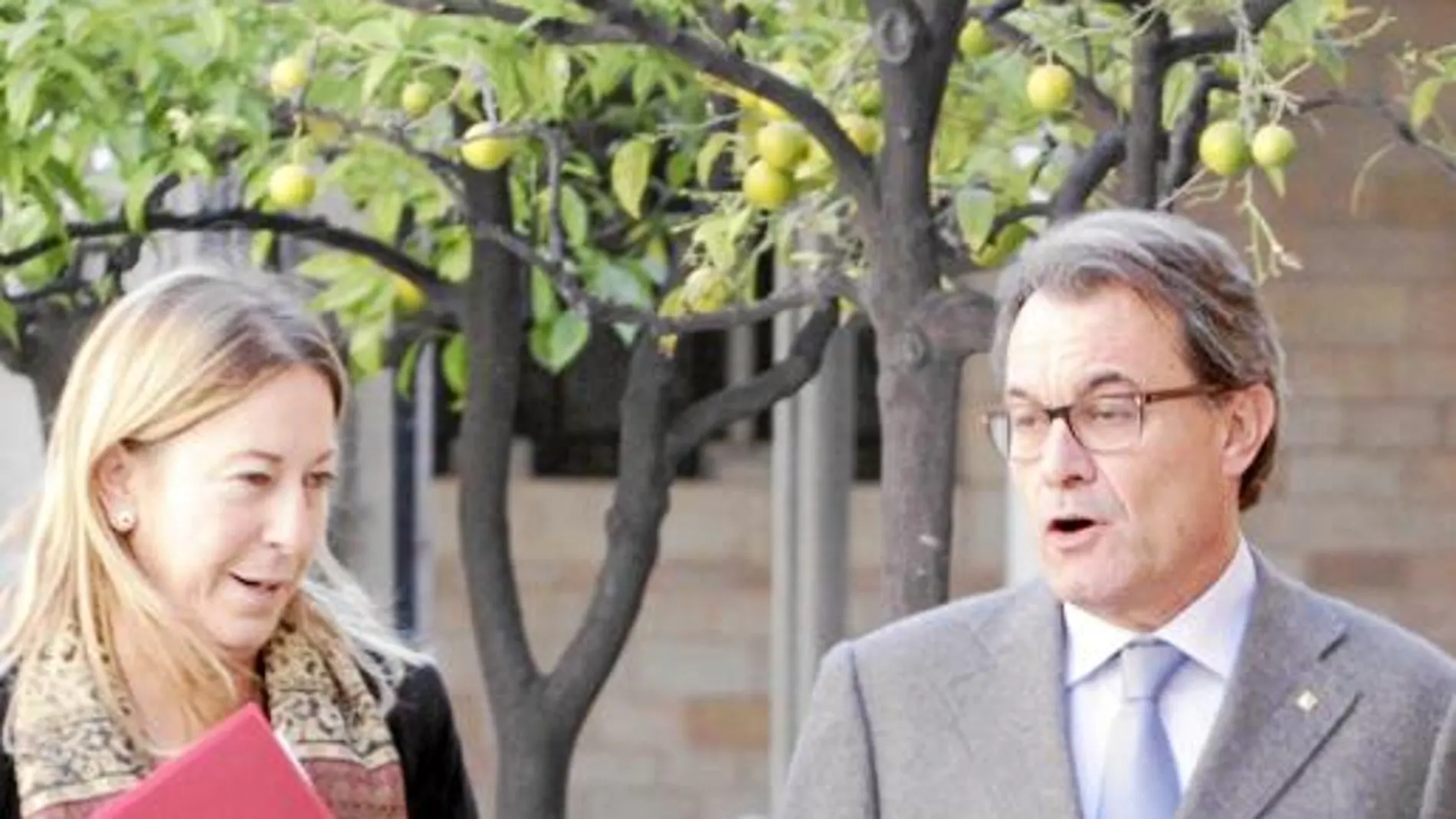 Artur Mas junto a Neus Munté, ayer en Barcelona
