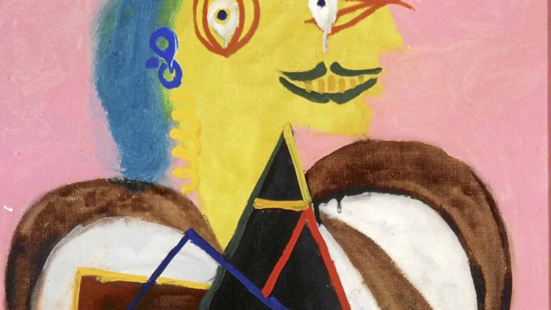 Lee Miller. Una de las fotógrafas más importantes del siglo XX, además, compañera de Roland Penrose, uno de los primeros especialistas de Pablo Picasso. El pintor la retrata aquí vestida de arlesiana en este impresionante óleo de 1937.