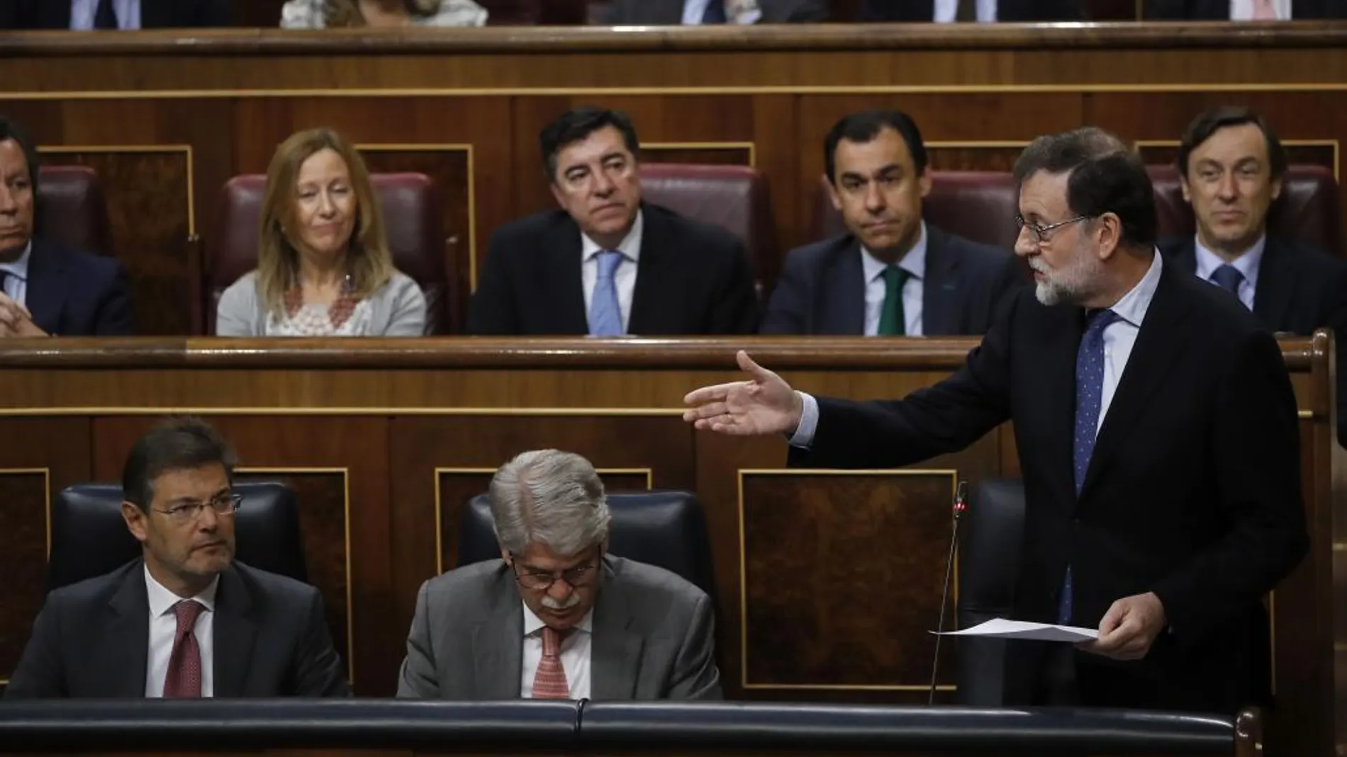 El presidente del Gobierno, Mariano Rajoy, durante su intervención hoy en el Congreso para responder a las preguntas de la oposición sobre la corrupción política