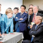 La canciller alemana, Angela Merkel, se encara a Donald Trump en un tenso encuentro en el G-7 celebrado en Quebec en junio de este año