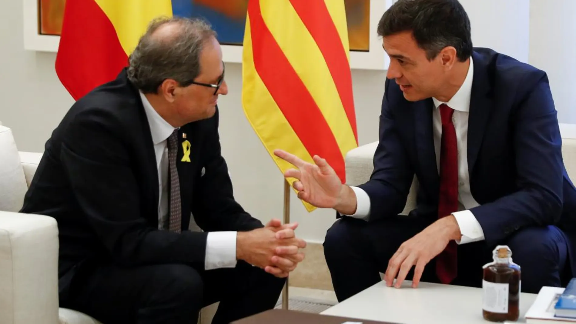 El presidente del Gobierno, Pedro Sánchez, junto al presidente de la Generalitat, Quim Torra