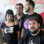 Óscar Reina, portavoz del Sindicato Andaluz de Trabajadores (SAT), abajo a la derecha, en un acto de la organización