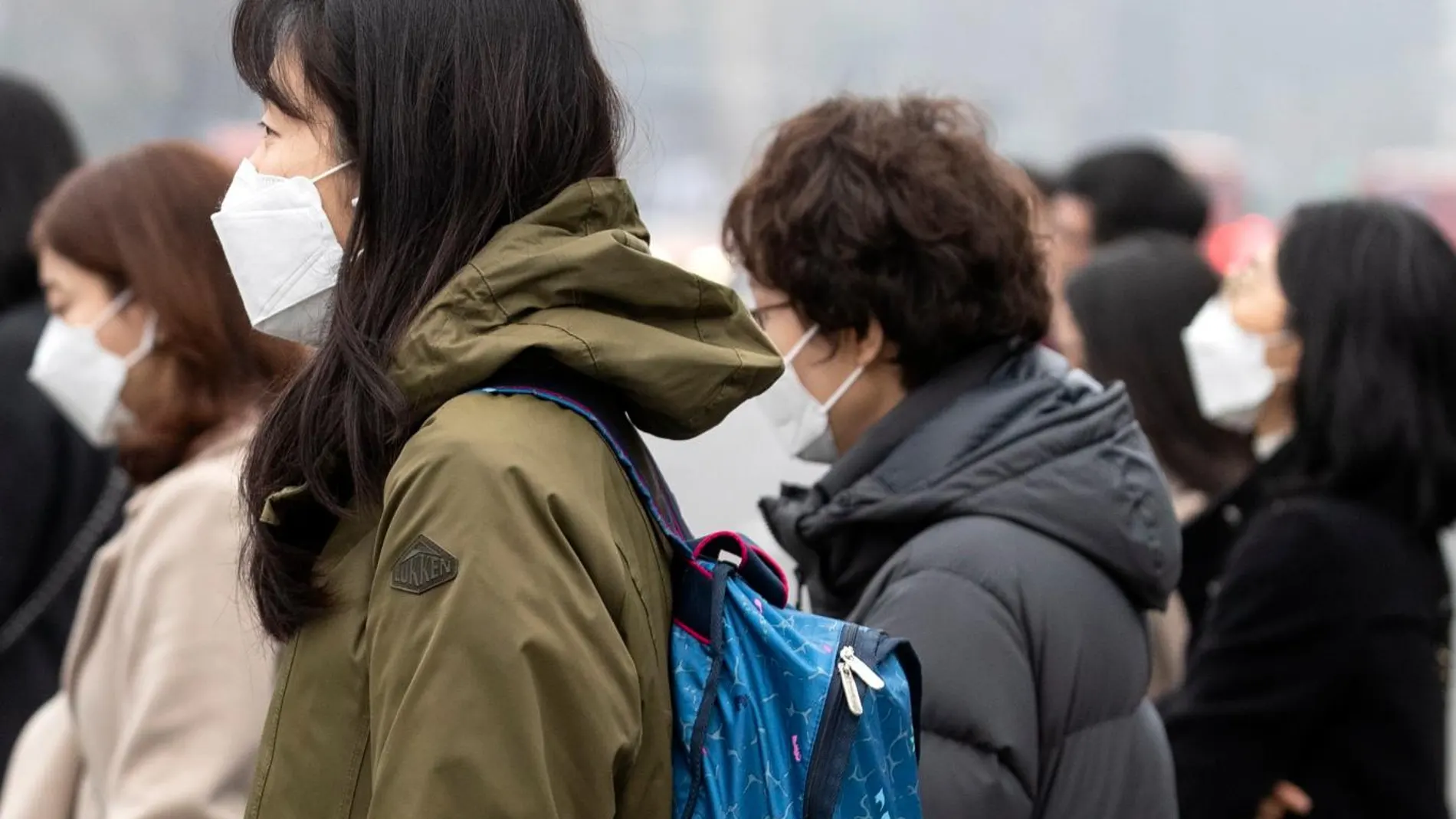 Personas con mascarilla