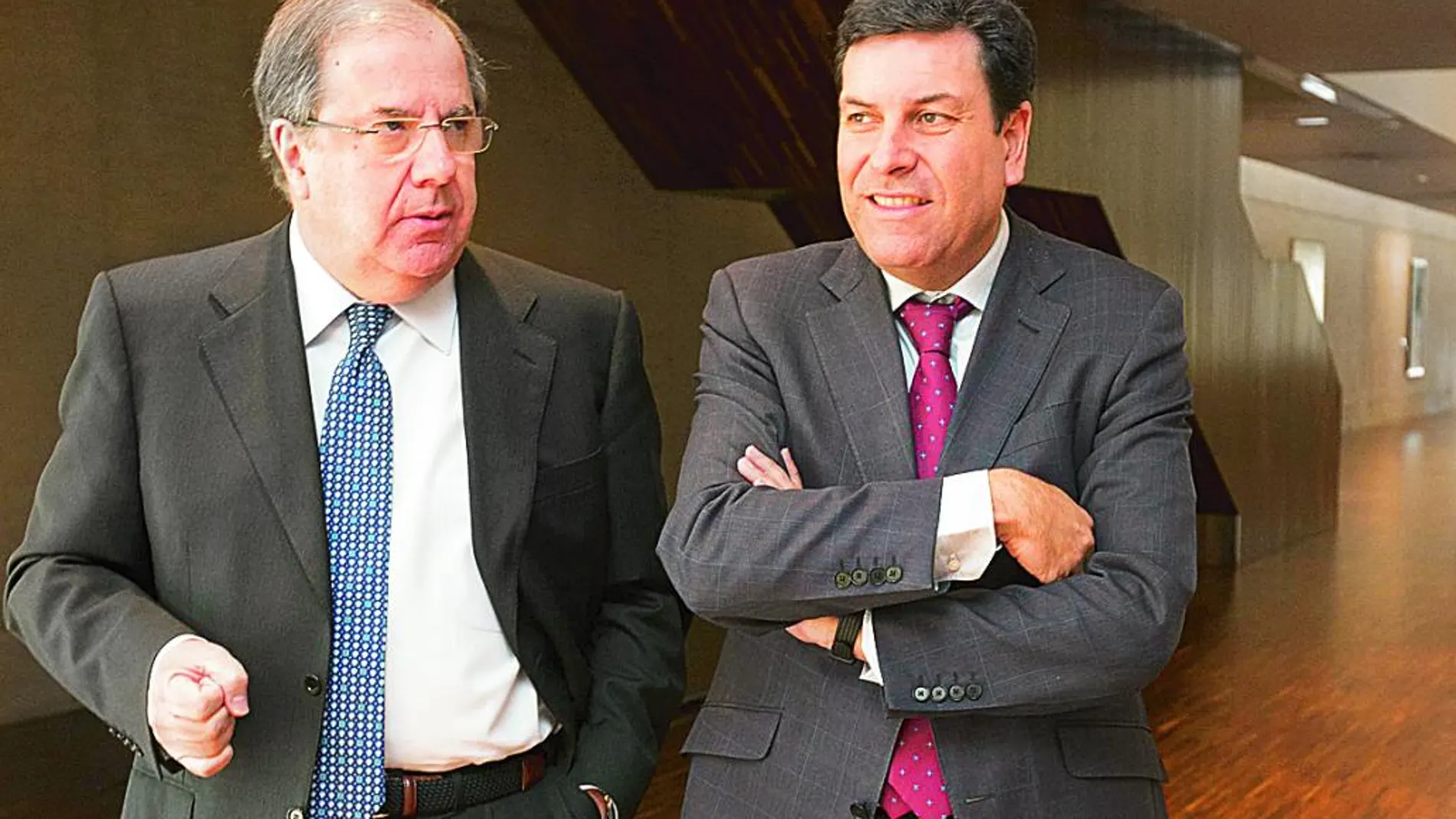 El presidente de la Junta, Juan Vicente Herrera, junto al consejero de Empleo, Carlos Fernández Carriedo.