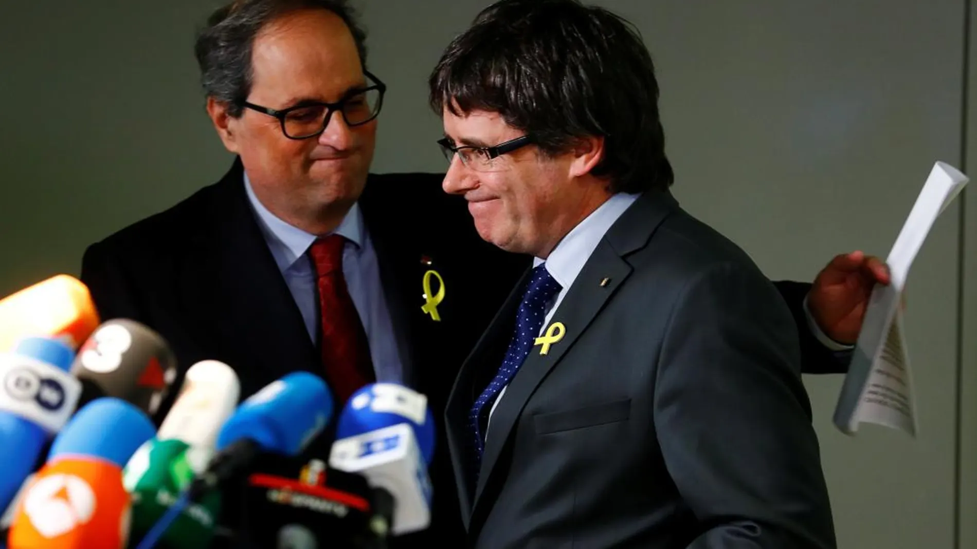 Quim Torra y su predecessor Carles Puigdemont hoy en Berlín. REUTERS/Hannibal Hanschke