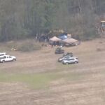 Agentes trabajan en la zona donde podrían estar los cuerpos.
