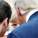 Macron, Merkel y Trump departen al principio de la primera sesión de trabajo en la cumbre del G20 en Hamburgo, en julio de 2017