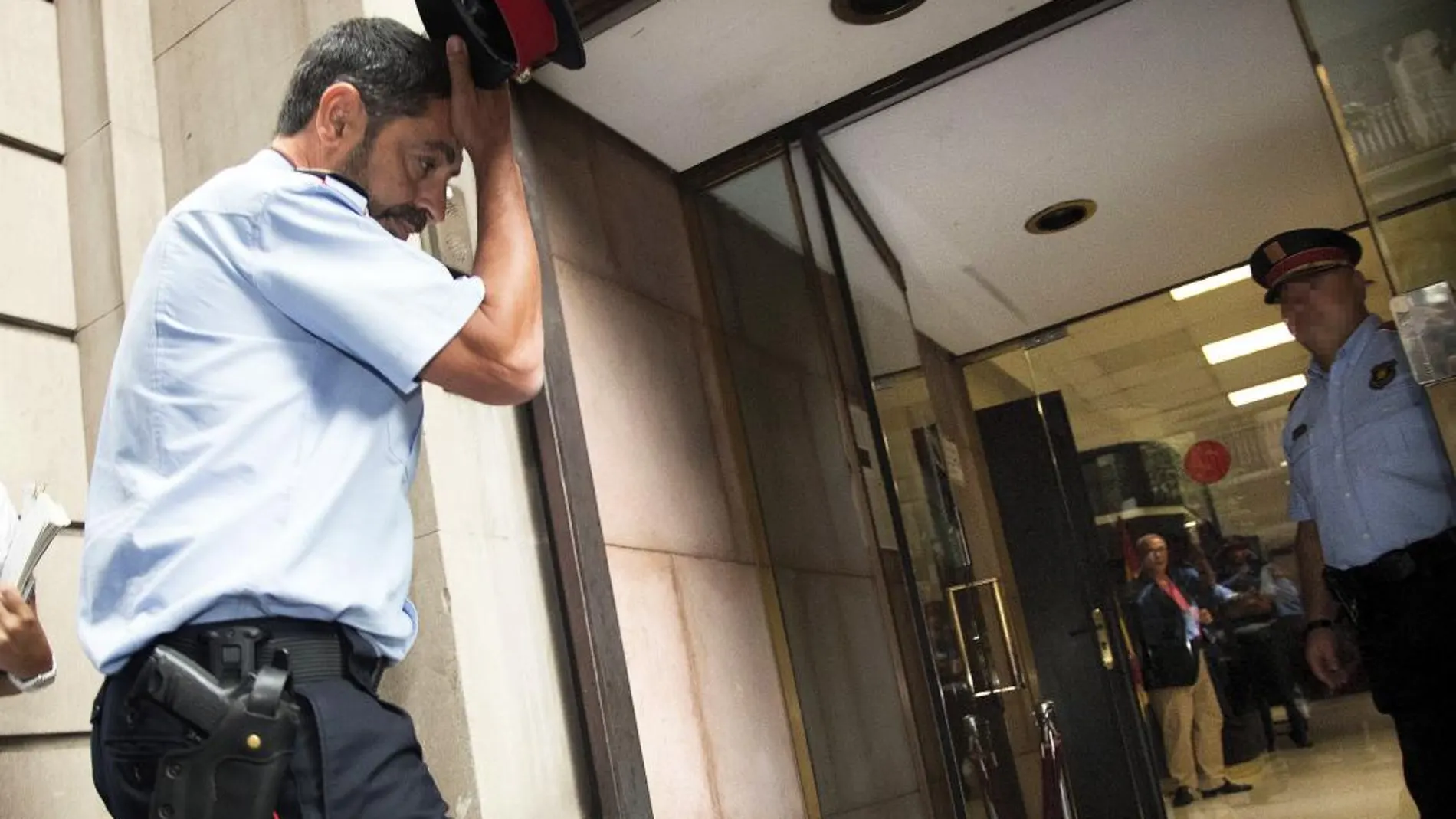 El jefe de los Mossos, Josep Lluis Trapero,llega la semana pasada a la fiscalía del TSJC para declarar
