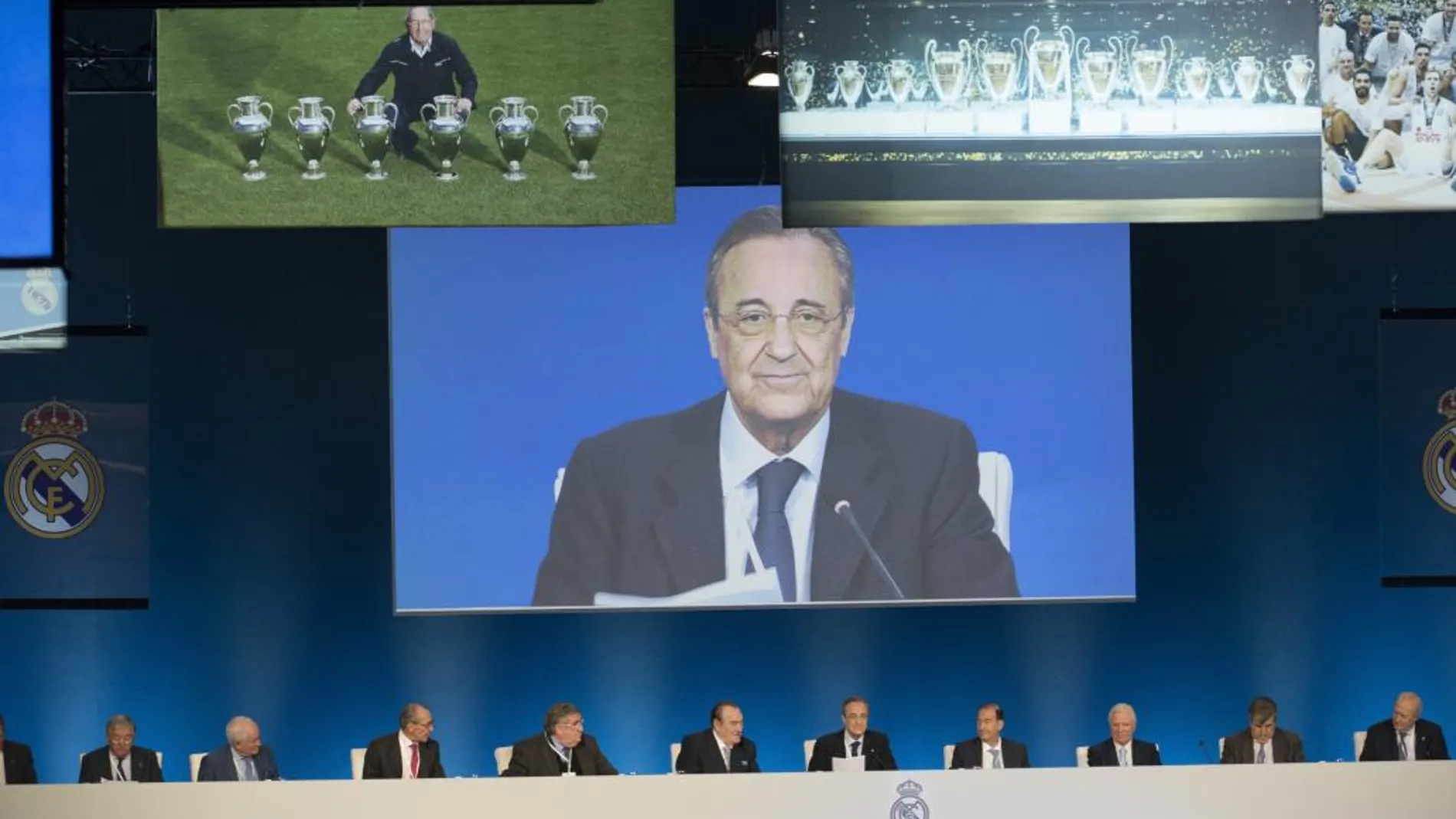 El presidente del Real Madrid, Florentino Pérez, en la pantalla principal, flanqueado por imágenes de Paco Gento y de las 11 Copas de Europa