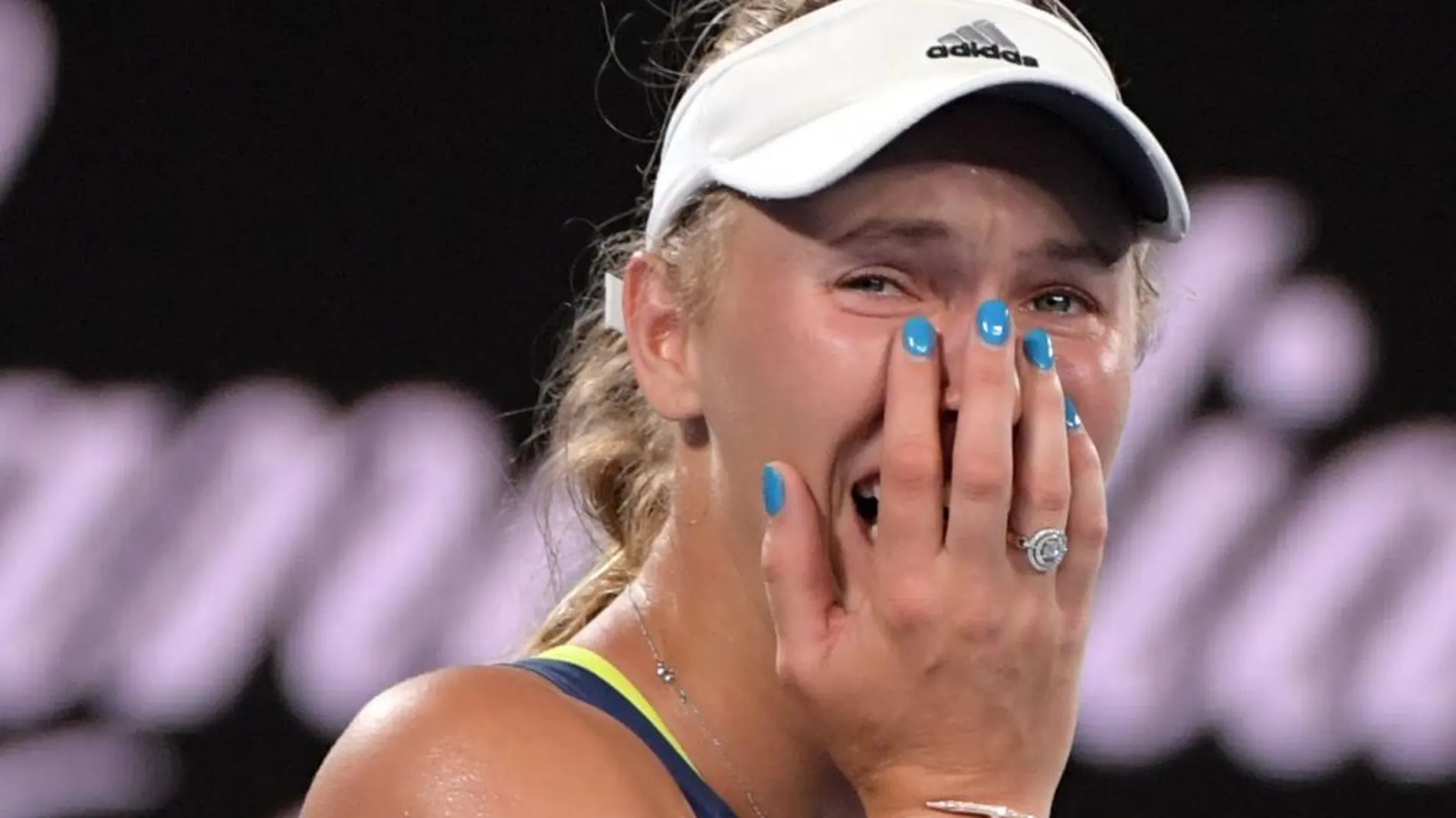 Caroline Wozniacki celebra entre lágrimas su primer grande