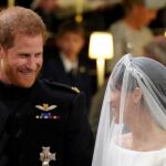 El príncipe Harry mira sonriente a Meghan/Foto: Reuters