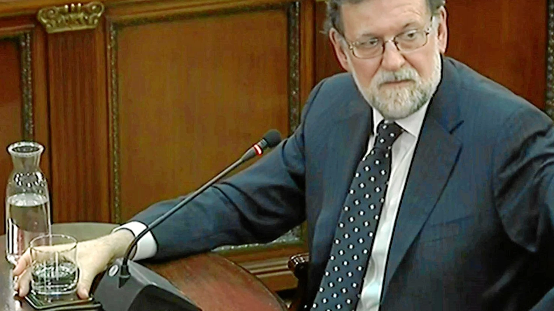 Rajoy, la firmeza del registrador