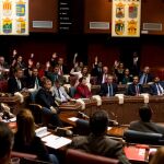Imagen de la bancada popular durante la votación, rechazando las enmiendas a la totalidad de PSOE y Podemos, ayer en la sesión parlamentaria en la Asamblea Regional