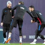 Messi, Piqué y Luis Suárez, en el entrenamiento del ayer del Barcelona