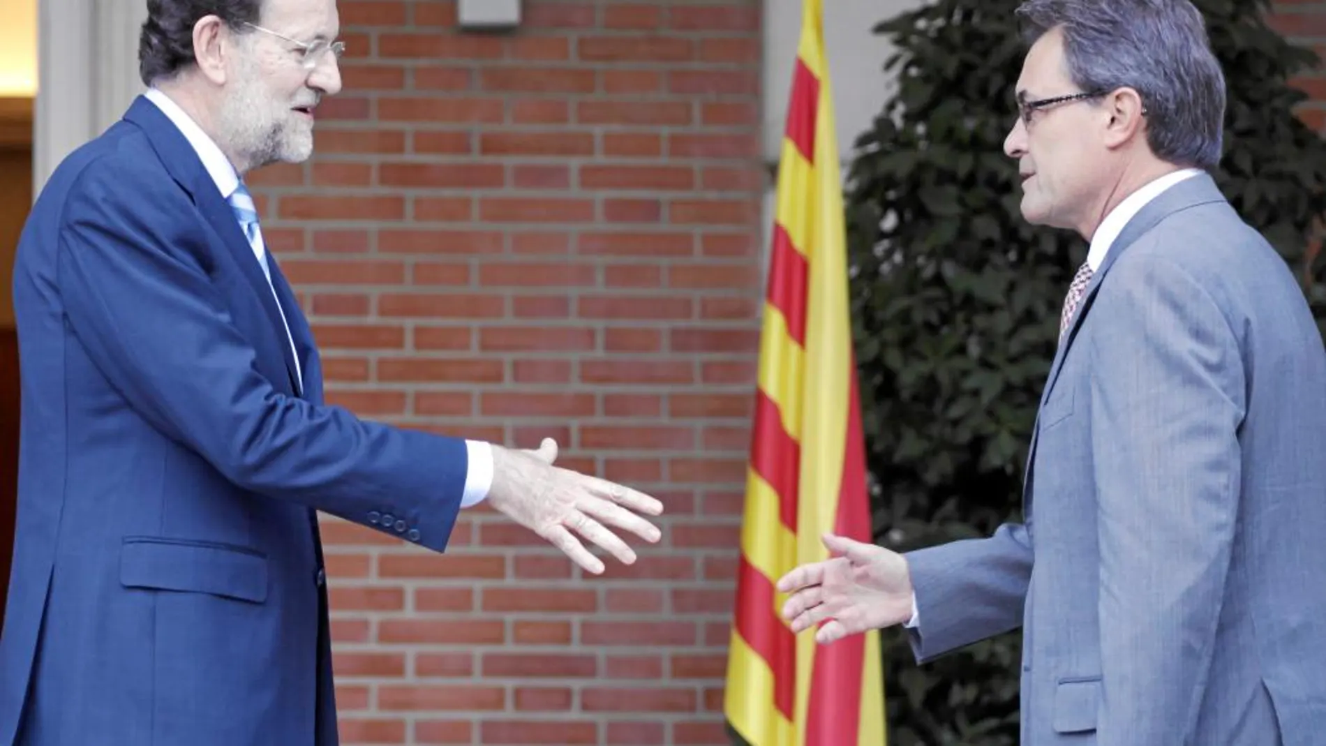 El presidente del Gobierno, Mariano Rajoy, y el de la Generalitat, Artur Mas en La Moncloa