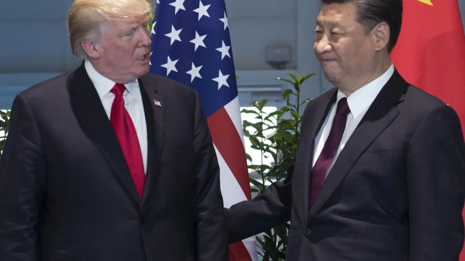 El presidente estadounidense, Donald Trump, l y su homólogo chino, Xi Jinping, el pasado mes de julio en la cumbre del G-20 en Hamburgo