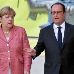 Merkel y Hollande, durante un encuentro en Francia
