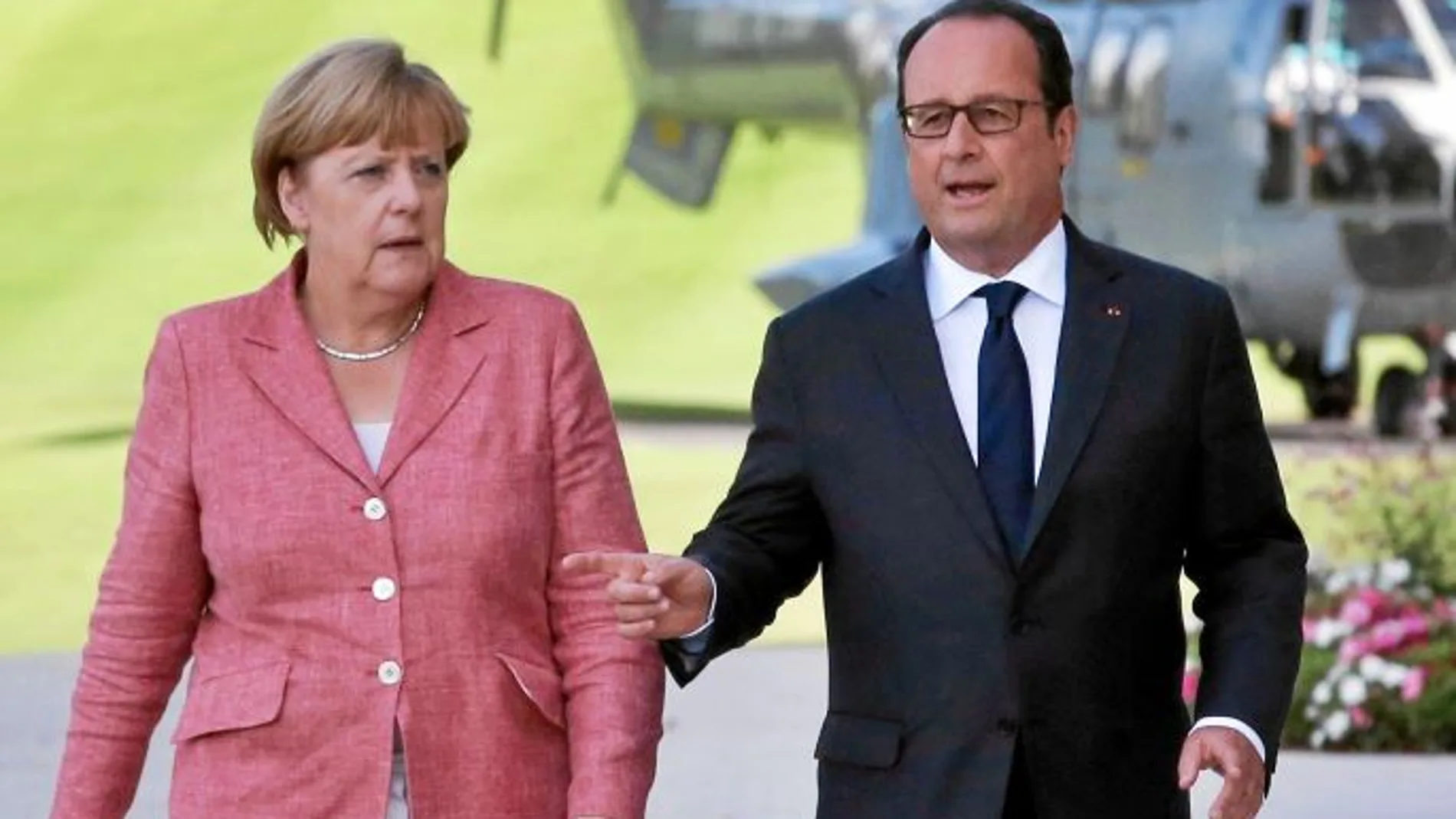 Merkel y Hollande, durante un encuentro en Francia