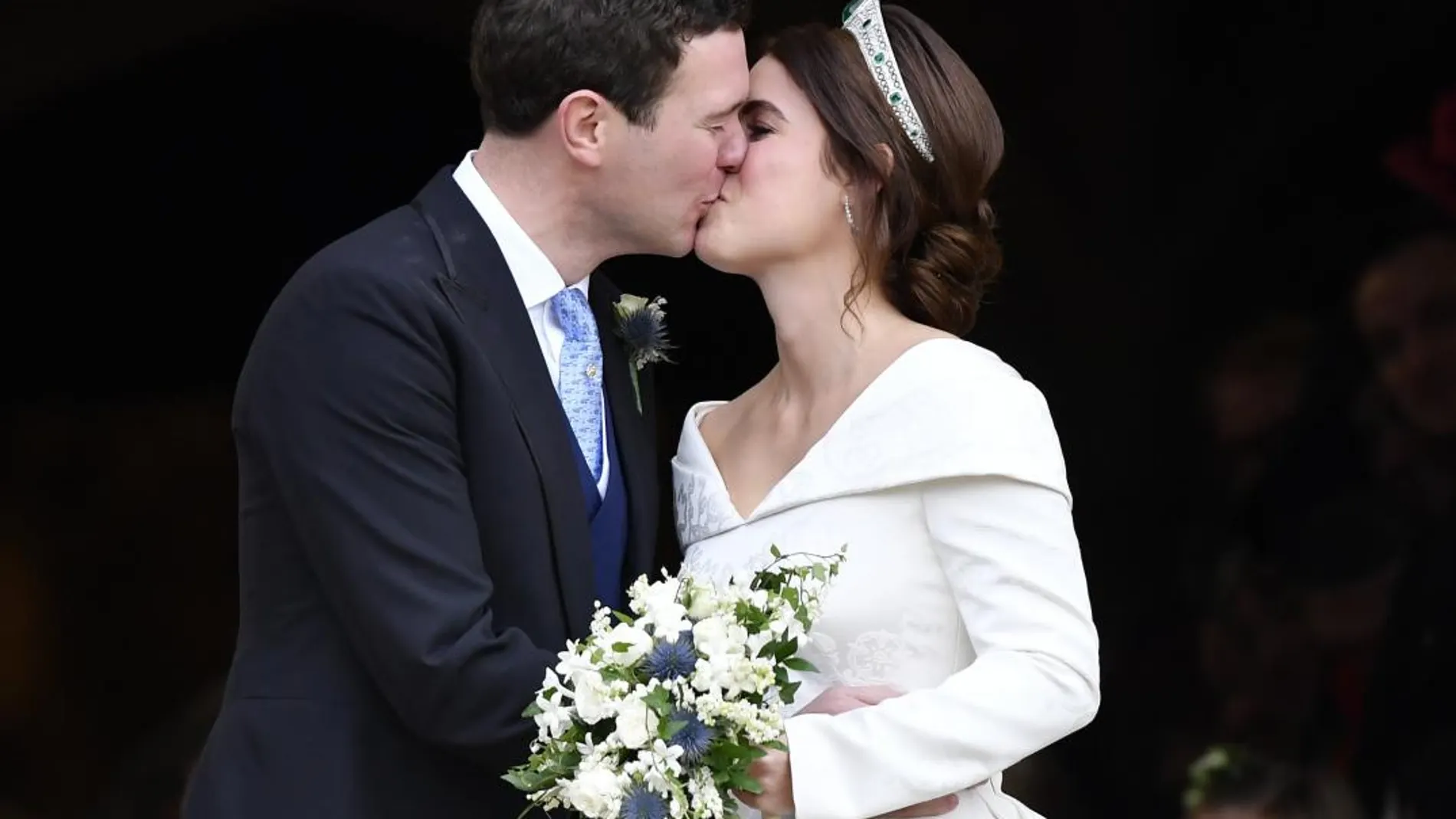Princess Eugenie and Jack Brooksbank kiss after their wedding at St Georgeâ€™s Chapel, Windsor Castle, near London, England, Friday Oct. 12, 2018. (Toby Melville, Pool via AP)