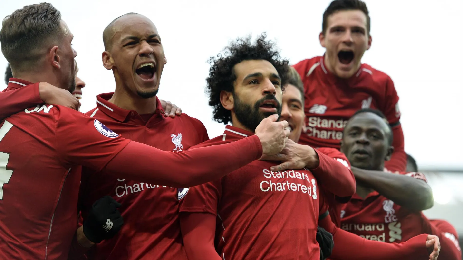 Los jugadores del Liverpool celebran el gol de Salah