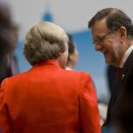 Theresa May y Mariano Rajoy durante la cumbre del G20 en Hangzhou