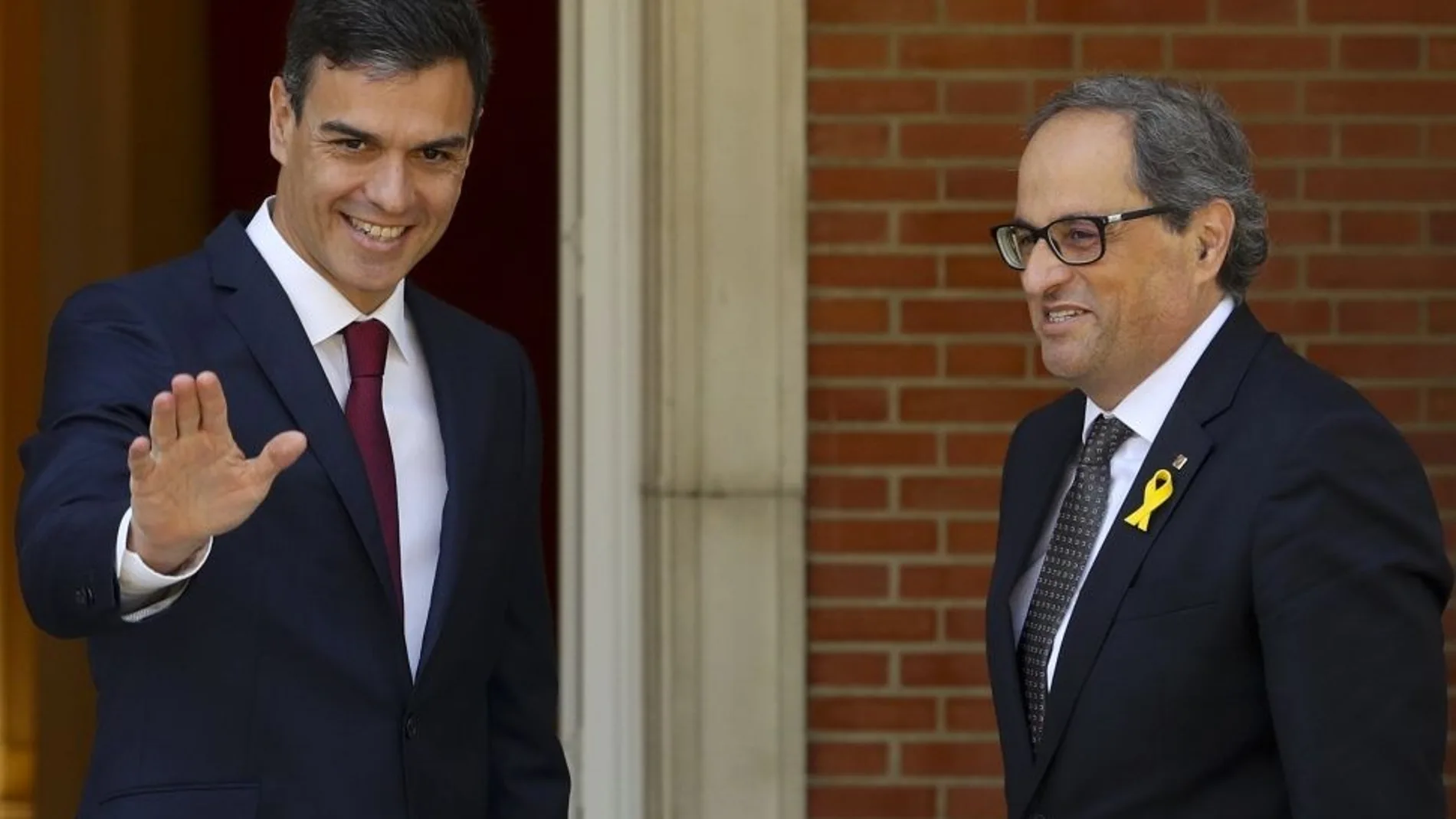 El presidente del Gobierno, Pedro Sánchez, y el presidente de la Generalitat, Quim Torra, en una imagen de archivo / Efe