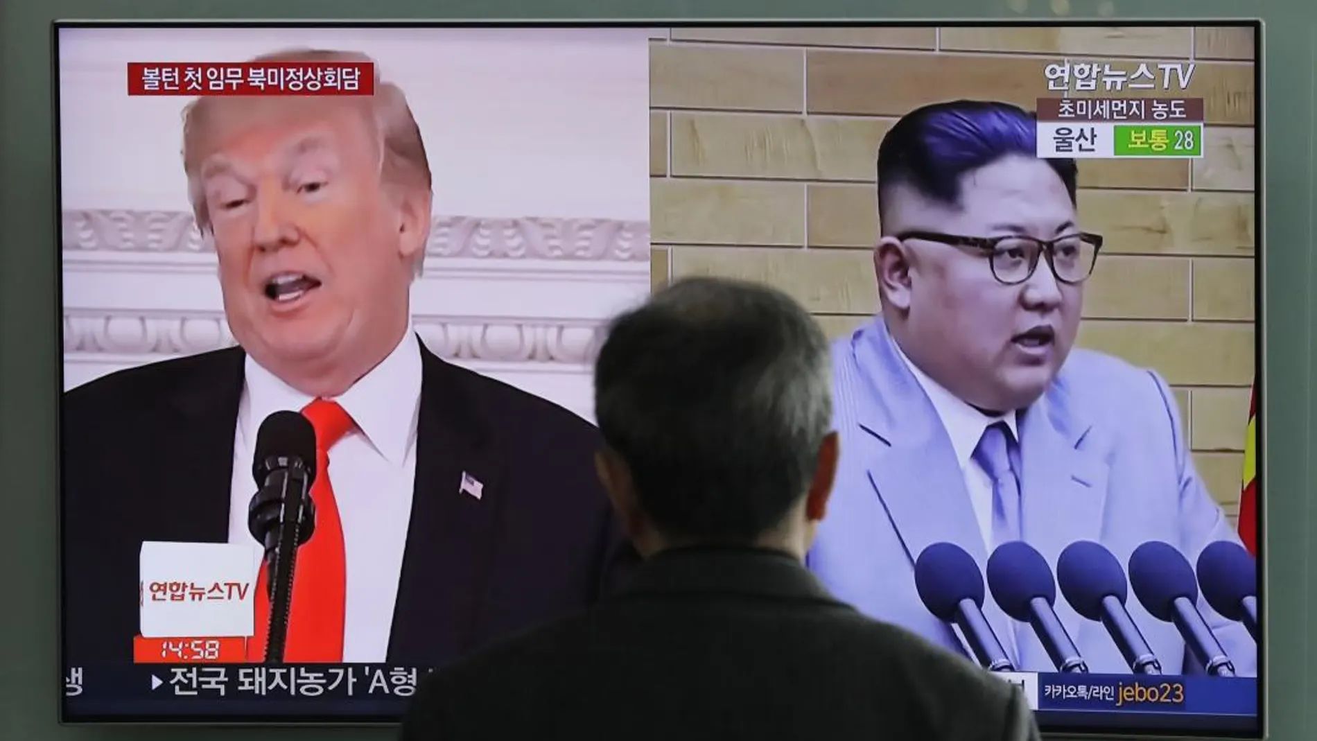 Trump y Kim Jong Un, en una televisión en Seúl