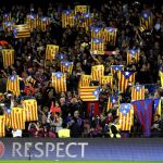 Esteladas durante el partido entre FC Barcelona y Manchester City en el Camp Nou.