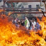 CONFLICTOS. En Valencia capital hubo quema de contenedores durante la protesta de ayer