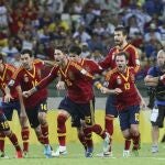 Spain's players celebrate after defeating Italy in a penalty shootout during the soccer Confederations Cup semifinal match at Castelao stadium in Fortaleza, Brazil, Thursday, June 27, 2013. (AP Photo/Eugene Hoshiko)