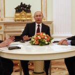 Angela Merkel con Vladimir Putin y Francois Hollande